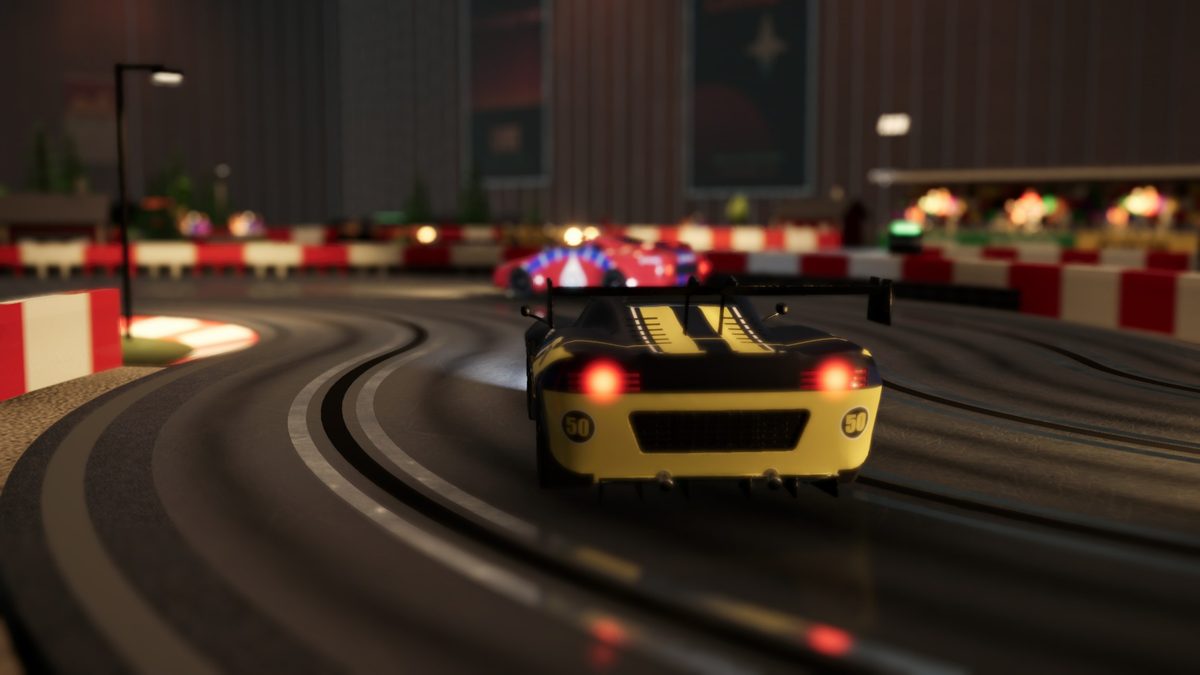A car's tail lights glow through a corner at night